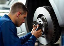 Brake Repair & Replacement - technician replacing disc brakes
