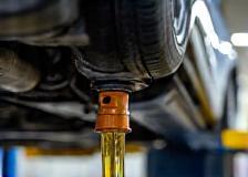 Oil Changes & Maintenance - oil being changed in clean bay